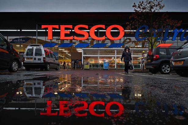 FILE-Tesco-Posts-Record-Loss